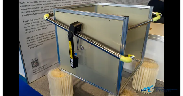 Stairio prototype on a handrail demonstration rig